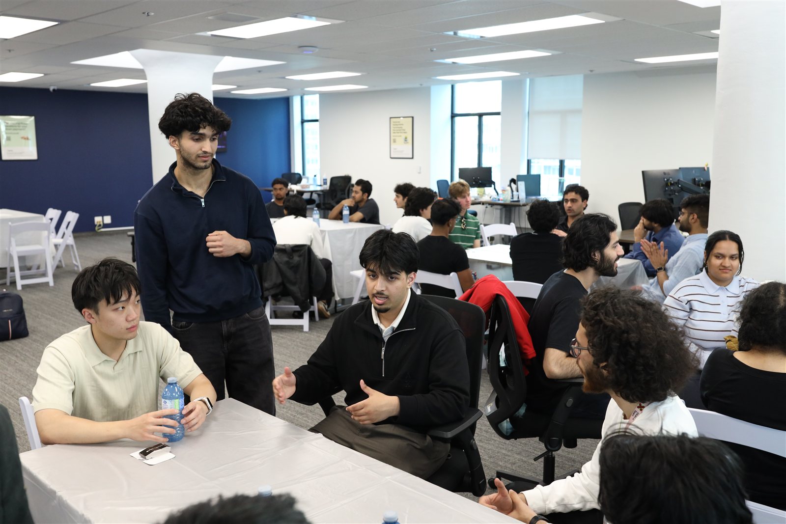 Students networking at the NextGen Collective event